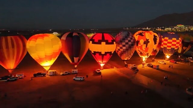 The 2025 Night Glow from the air: the row of balloons lit at dusk